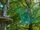 Group adventures at Tree Tops Trail - Tenby's junior and senior adventure high ropes courses