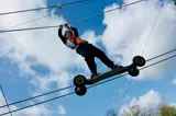 Skateboard Cross at Tree Tops Trail junior high ropes adventure - Tenby, Pembrokeshire, South West Wales