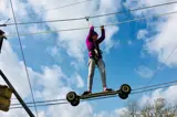 Skateboard Cross at Tree Tops Trail junior high ropes adventure - Tenby, Pembrokeshire, South West Wales